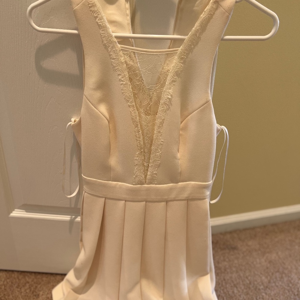 Cute BCBG cream dress